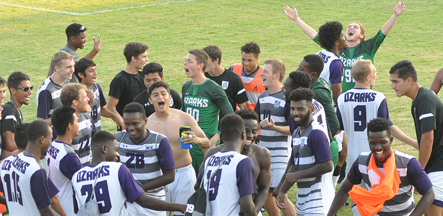 The men's soccer team celebrates following a 1-0 win over Williams Baptist Saturday.