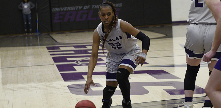 Shakira Neal drives to the basket against Hardin-Simmons. Neal played in her final game at Ozarks.
