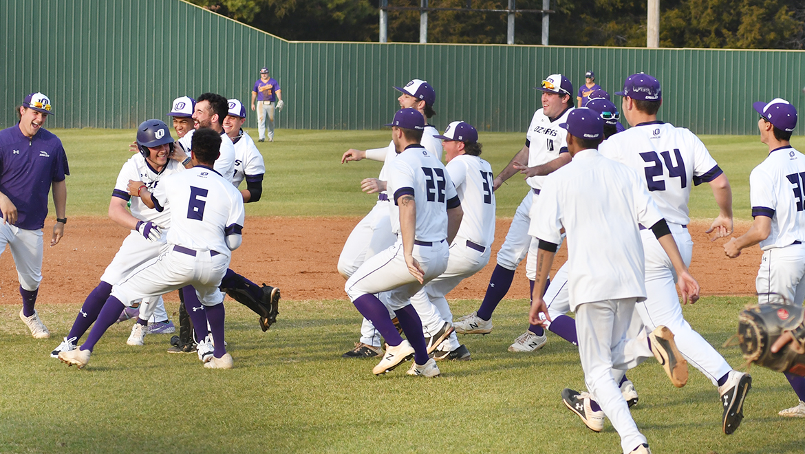 The Eagles celebrate Dru Didway's walk-off double against UMHB.