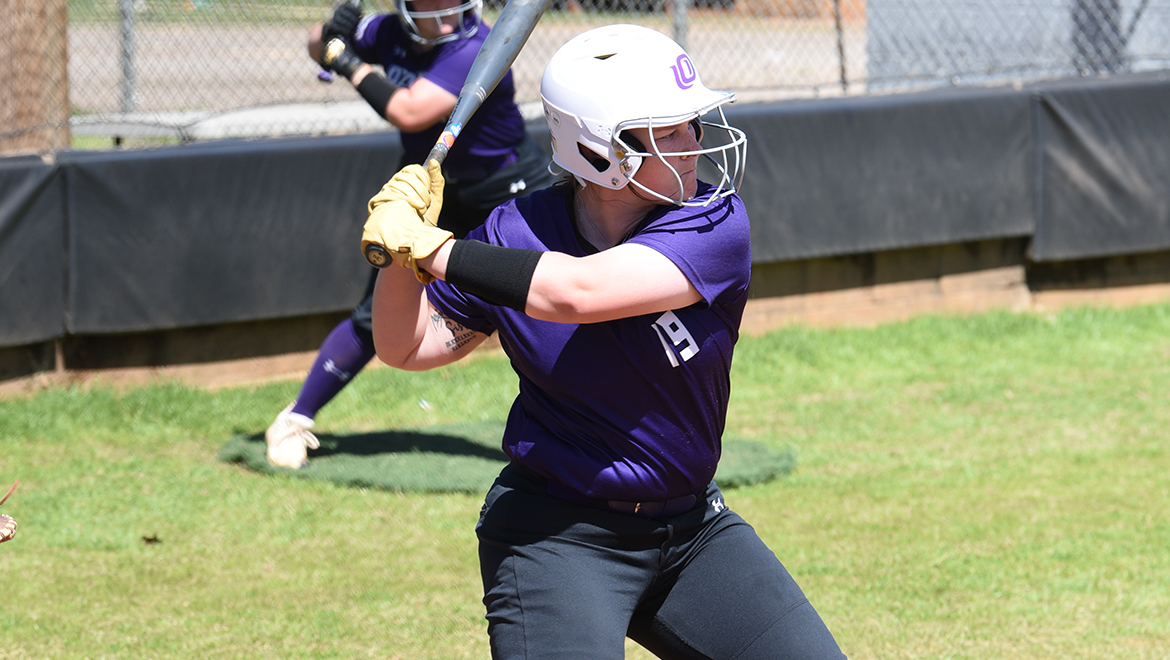 Blaise English hits one of her two home runs against Hendrix.