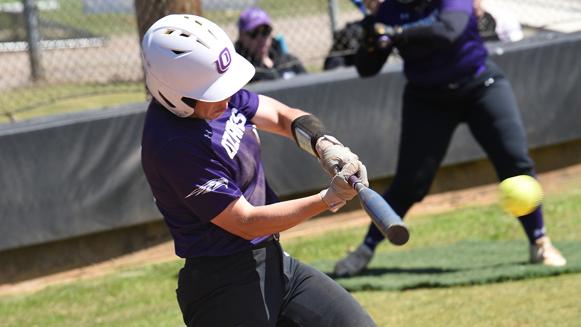 Sierra Jasna smashes a double against Texas Dallas on Saturday.
