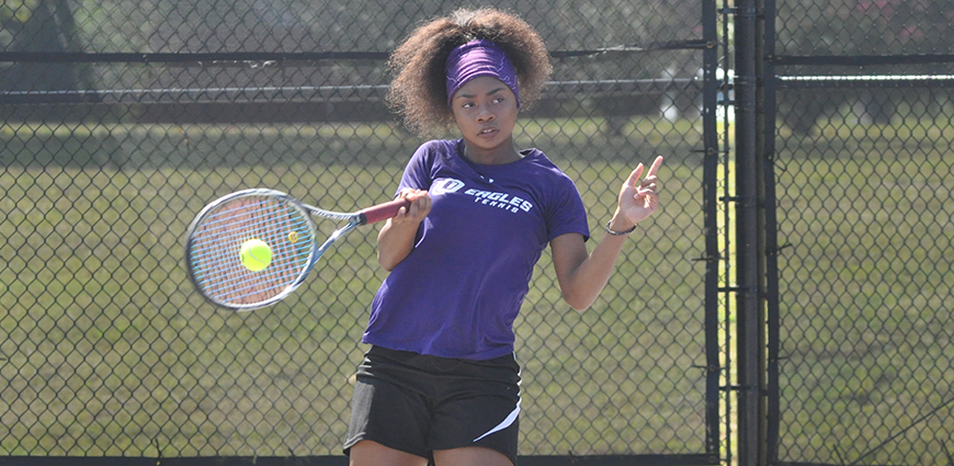 Abrian Johnson battled in a doubles match against Hendrix College.