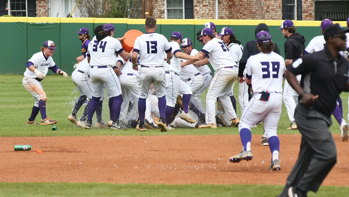 The Eagles celebrate a wild win on Senior Day against Mary Hardin-Baylor. 