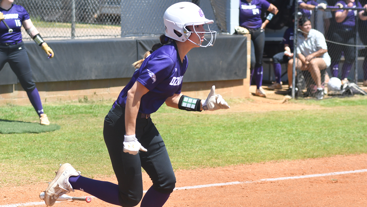 Magaret Blackstar runs to first against Sul Ross State in game three.
